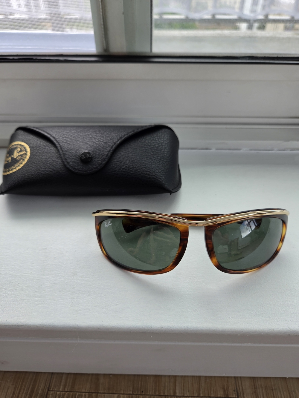 Ray-Ban Tortoiseshell Sunglasses with Black Lenses and Gold Accents